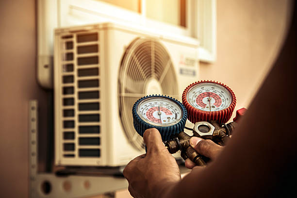 Professional Furnace Repair technician working in East Nassau, NY